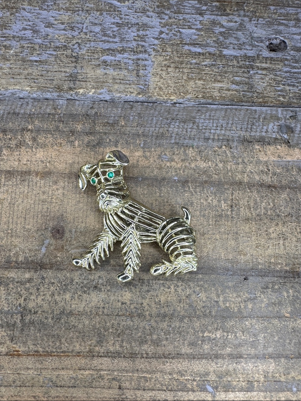 Gold Tone Dog Brooch with Green Rhinestone like Eyes